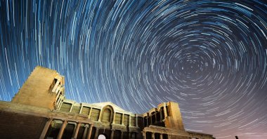 A Perseid meteor shower at the Sardes Ancient City in Manisa, Türkiye, Aug. 11, 2024. (IHA Photo)