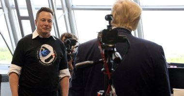 U.S. President Donald Trump (R) and Elon Musk greet each other at NASA&#039;s Kennedy Space Center after the SpaceX Falcon 9 launch, Florida, U.S., May 30, 2020. (Reuters Photo)