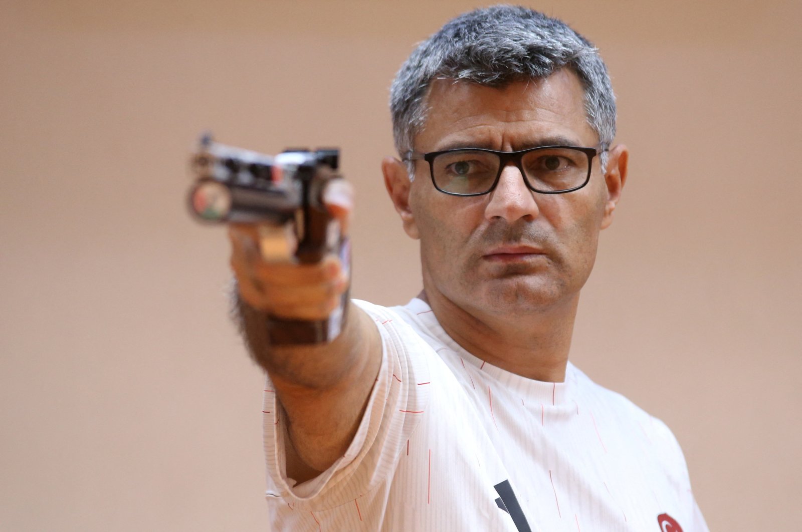 Turkish shooter Yusuf Dikeç, who won the silver in the mixed team 10-meter air pistol event in the Paris 2024 Olympics combined with Sevval Ilayda Tarhan, is pictured during training, Ankara, Türkiye, Aug. 8, 2024. (Reuters Photo)