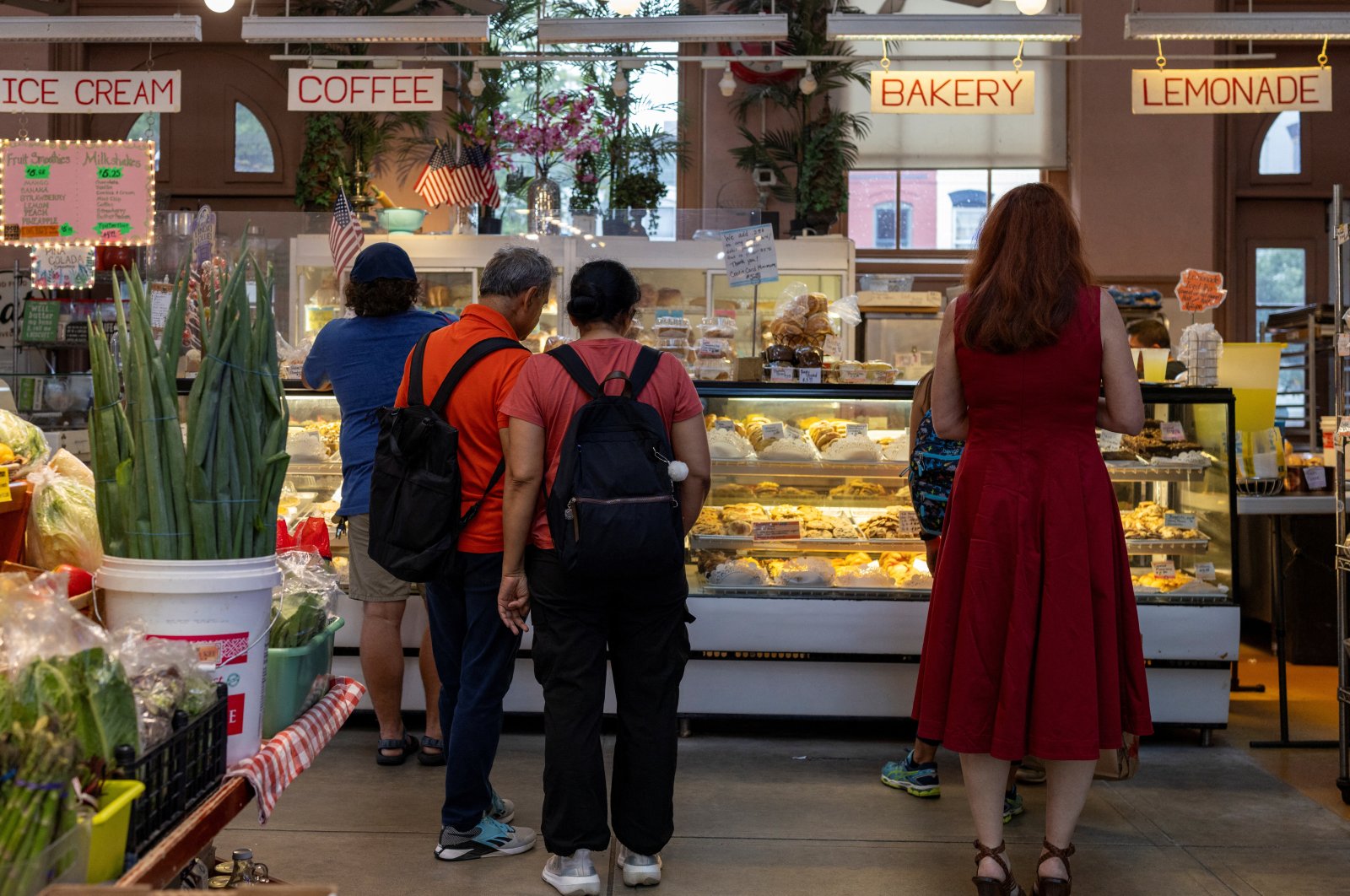 People shop at Eastern Market, Washington, D.C., U.S., Aug. 9, 2024. (Reuters Photo)