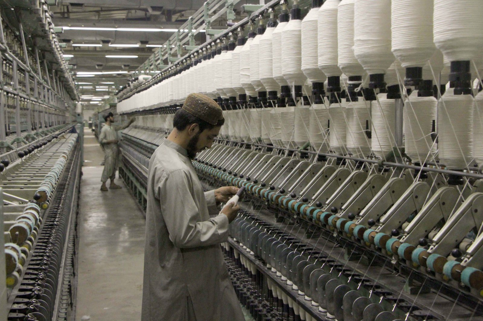 An Afghan laborer works at the Nakhi cotton textile factory in Kandahar, Afghanistan, Aug. 8, 2024. (EPA Photo)