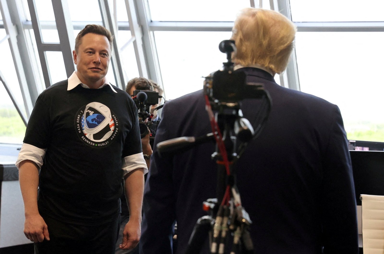 U.S. President Donald Trump (R) and Elon Musk greet each other at NASA&#039;s Kennedy Space Center after the SpaceX Falcon 9 launch, Florida, U.S., May 30, 2020. (Reuters Photo)