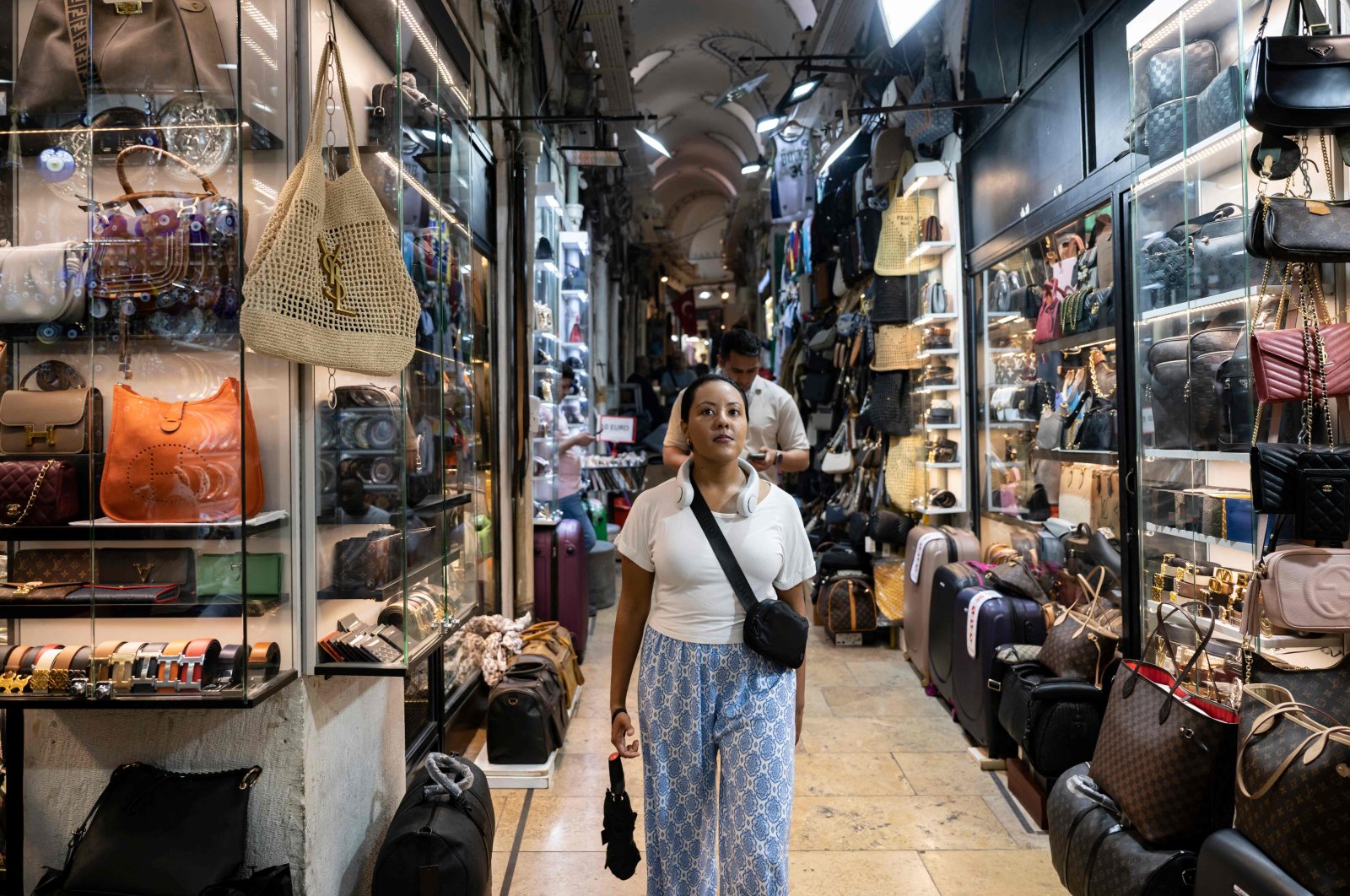 Visitors walk past shops at the historical Grand Bazaar, Istanbul, Türkiye, July 9, 2024. (AFP Photo)