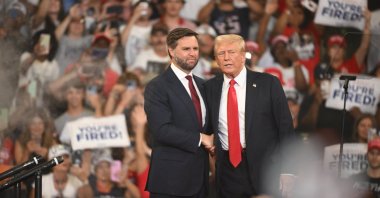 Republican presidential candidate Donald J. Trump (R) and Republican vice presidential candidate Senator JD Vance (L) of Ohio appear on stage during a campaign rally at the Georgia State Convocation Center, Atlanta, Georgia, U.S., Aug. 3, 2024. (EPA Photo)