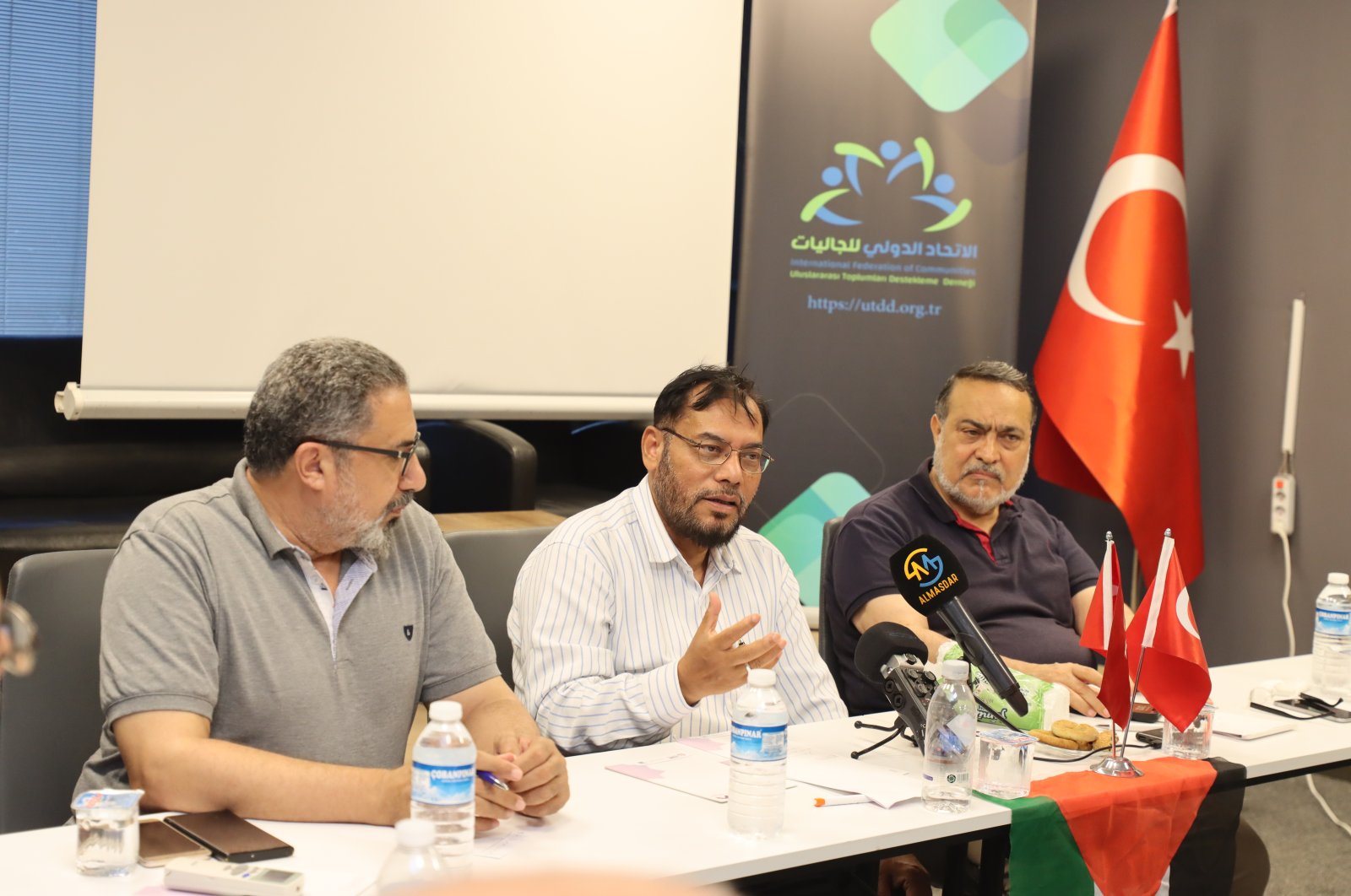 Daily Sabah&#039;s Muhammad Zakir Hussain (C) at the Bangladesh symposium, Istanbul, Türkiye, Aug. 10, 2024. (Courtesy International Federation of Communities)