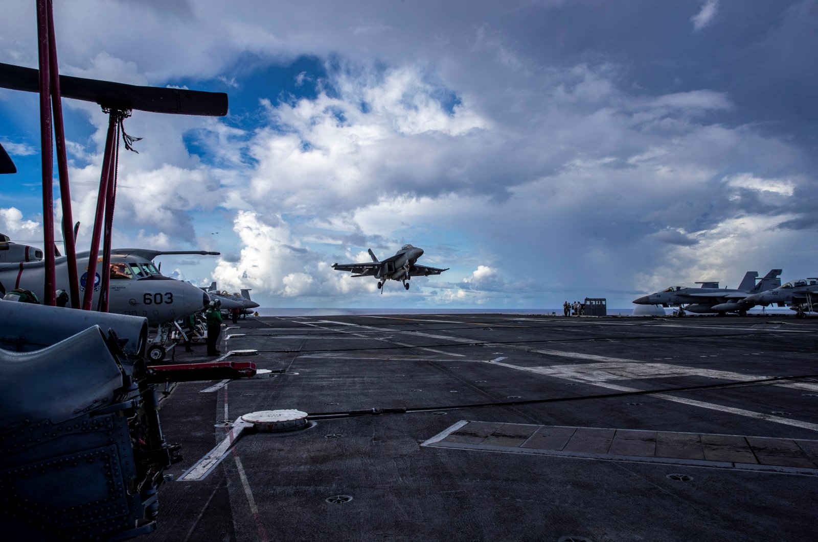 An F/A-18F Super Hornet, assigned to Strike Fighter Squadron (VFA) 41, prepares to make an arrested landing on the flight deck of the U.S. Navy Nimitz-class aircraft carrier USS Abraham Lincoln in the Pacific Ocean, Aug. 10, 2024. (U.S. Navy/Mass Communication Specialist Seaman Apprentice Daniel Kimmelman/Handout via Reuters)