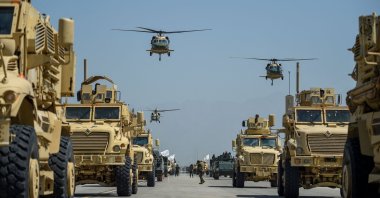 Taliban military helicopters fly on the third anniversary of their takeover of Afghanistan, at the Bagram Air Base, in Bagram, Parwan province, Afghanistan, Aug. 14, 2024. (AFP Photo)