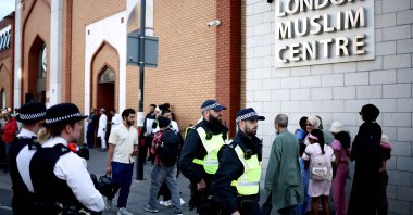 Police officers stand guard outside the East London Mosque after Friday prayers in Tower Hamlets in London, Aug. 9, 2024. (AFP Photo)