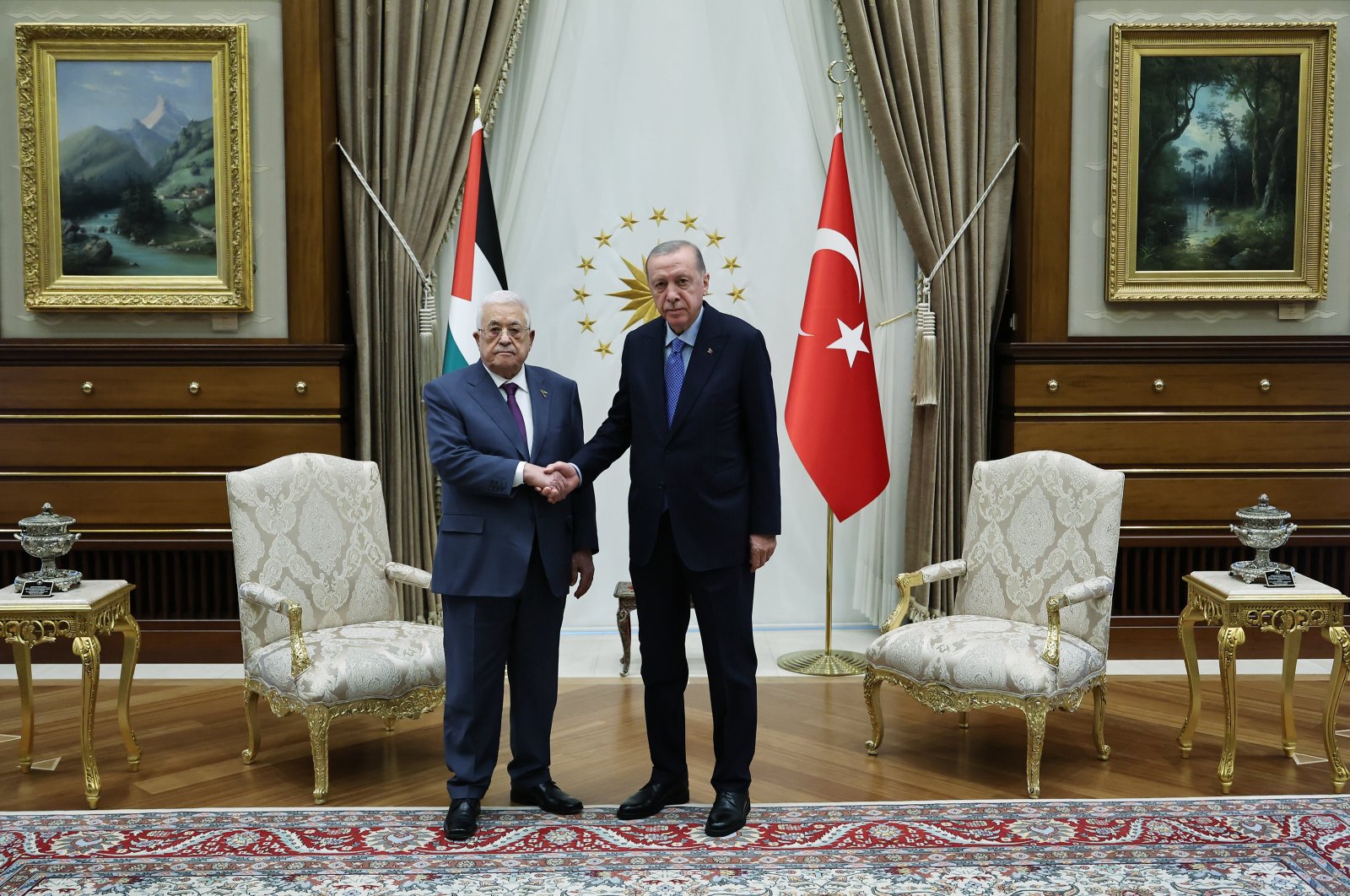 President Recep Tayyip Erdoğan and Palestinian President Mahmoud Abbas shake hands at the Presidential Complex in Ankara, Aug. 14, 2024. (AA Photo)