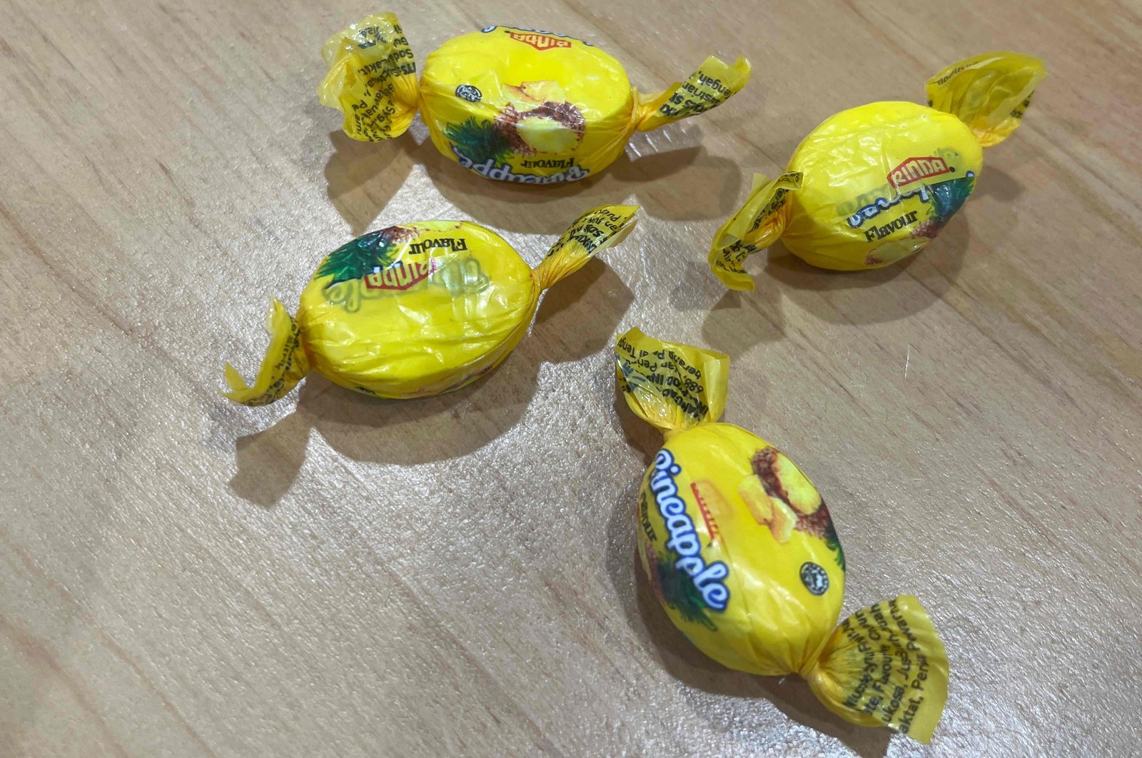 This handout taken on Aug. 13, 2024 and released on Aug. 14 by the New Zealand Police shows pineapple sweets laced with potentially lethal amounts of methamphetamine, in Auckland. (AFP Photo via New Zealand Police, Handout)