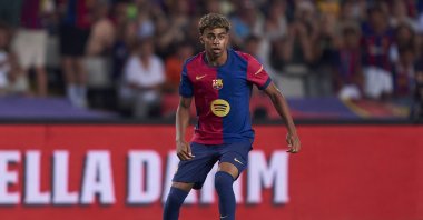 Barcelona's Lamine Yamal with the ball during the Joan Gamper Trophy match against Monaco at Estadi Olimpic Lluis Companys, Barcelona, Spain, Aug. 12, 2024. (Getty Images Photo)