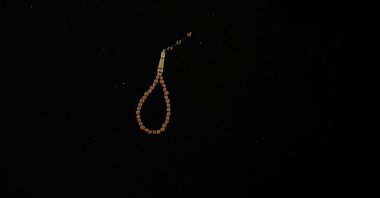 World's smallest prayer beads displayed, Diyarbakır, Türkiye, Aug. 15, 2024. (IHA Photo)