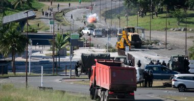 French gendarmes use tear gas to disperse pro-independence protesters in Dumbea, French Pacific territory of New Caledonia, June 24, 2024. (AFP Photo)