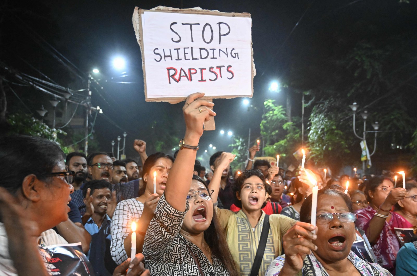 People protest the rape and murder of a young medic, in Kolkata, India, Aug. 14, 2024. (AFP Photo)