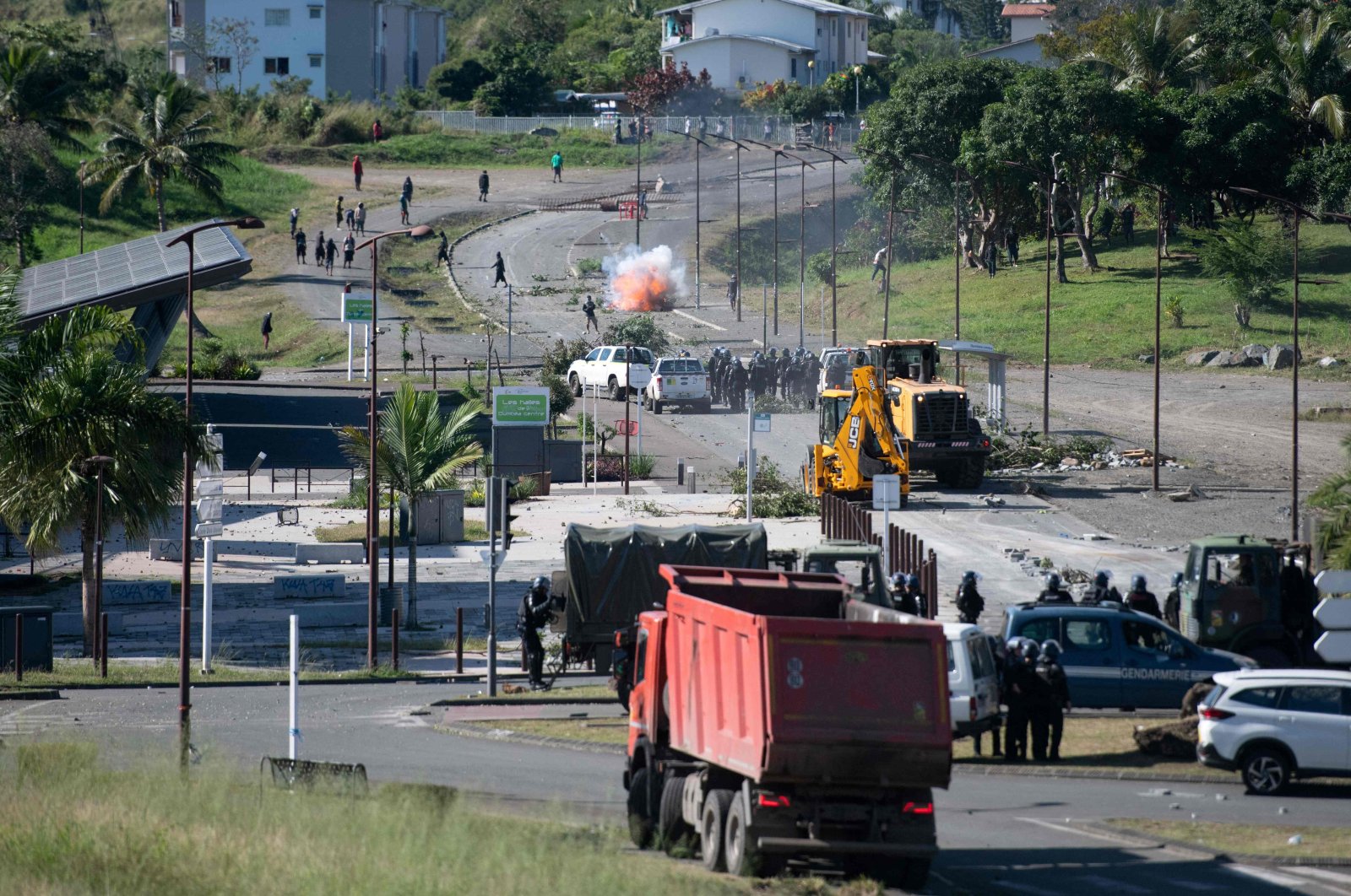 French gendarmes use tear gas to disperse pro-independence protesters in Dumbea, French Pacific territory of New Caledonia, June 24, 2024. (AFP Photo)