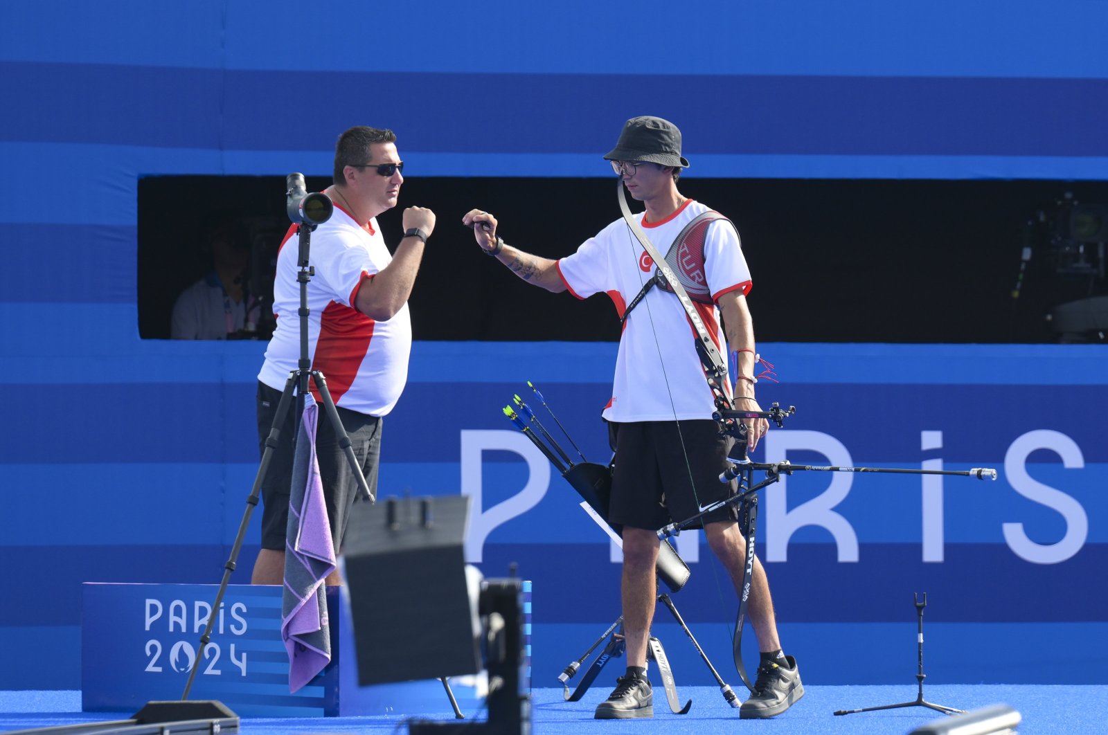 Türkiye&#039;s archery national team coach Yusuf Göktuğ Ergin (L) celebrates with Mete Gazoz at the 2024 Paris Olympics, Paris, France, July 30, 2024. (AA Photo)