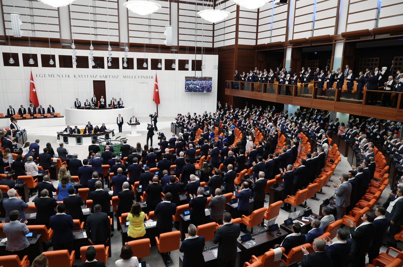 Lawmakers give a standing ovation to Palestinian President Mahmoud Abbas in Turkish Parliament, Aug. 15, 2024. (AA DHA Photo)