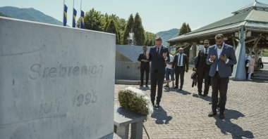 Turkish Cooperation and Coordination Agency (TIKA) President Serkan Kayalar (L) and other officials pray during a visit to the graves of the martyrs in Srebrenica, Bosnia-Herzegovina, Aug. 16, 2024. (AA Photo)
