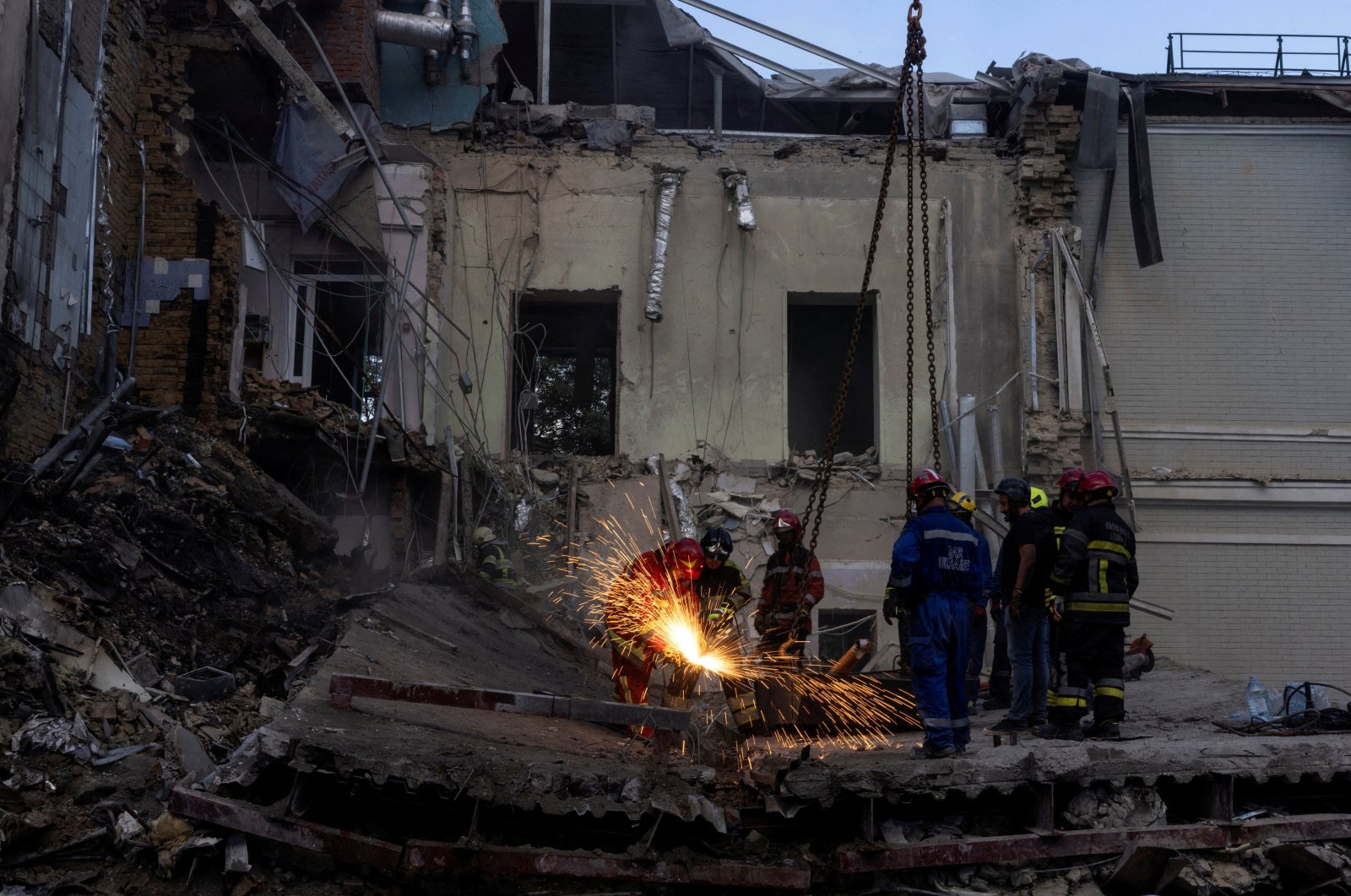 Rescue workers cut through metal rebars to clear the rubble following a Russian missile strike on the Okhmatdyt Children&#039;s Hospital, amid Russia&#039;s attack on Ukraine, Kyiv, Ukraine, July 8, 2024. (Reuters Photo)