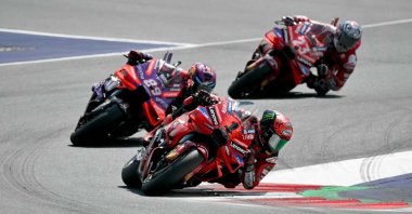 Ducati&#039;s Italian rider Francesco Bagnaia leads the pack in the Austrian MotoGP, Spielberg, Austria, Aug. 18, 2024. (AFP Photo)