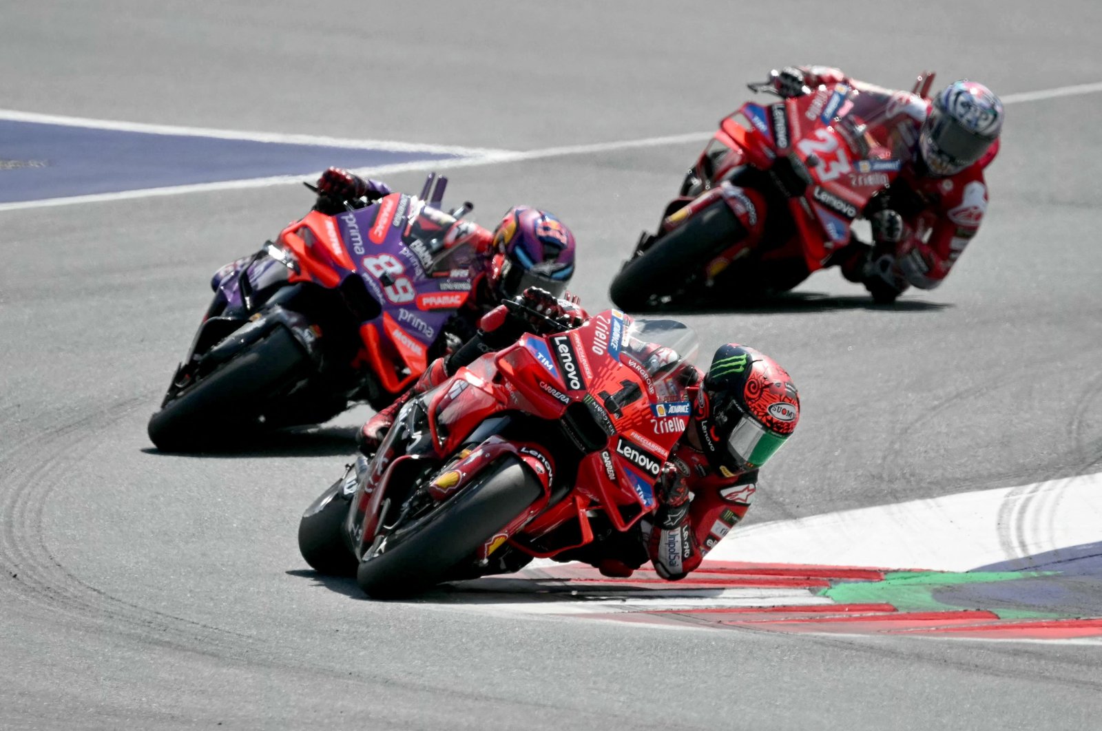 Ducati&#039;s Italian rider Francesco Bagnaia leads the pack in the Austrian MotoGP, Spielberg, Austria, Aug. 18, 2024. (AFP Photo)