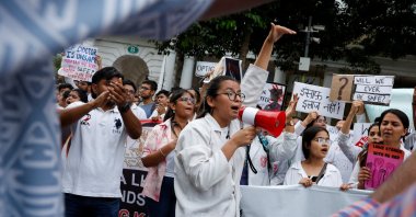 Doctors shout slogans as they hold a protest rally demanding justice following the rape and murder of a trainee medic at a hospital in Kolkata, in New Delhi, India, Aug. 18, 2024. (Reuters Photo)