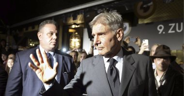 U.S. film actor and producer Harrison Ford arrives to receive the Lifetime Achievement Award at the Zurich Film Festival, Zurich, Switzerland, Oct. 4, 2013. (AP Photo)