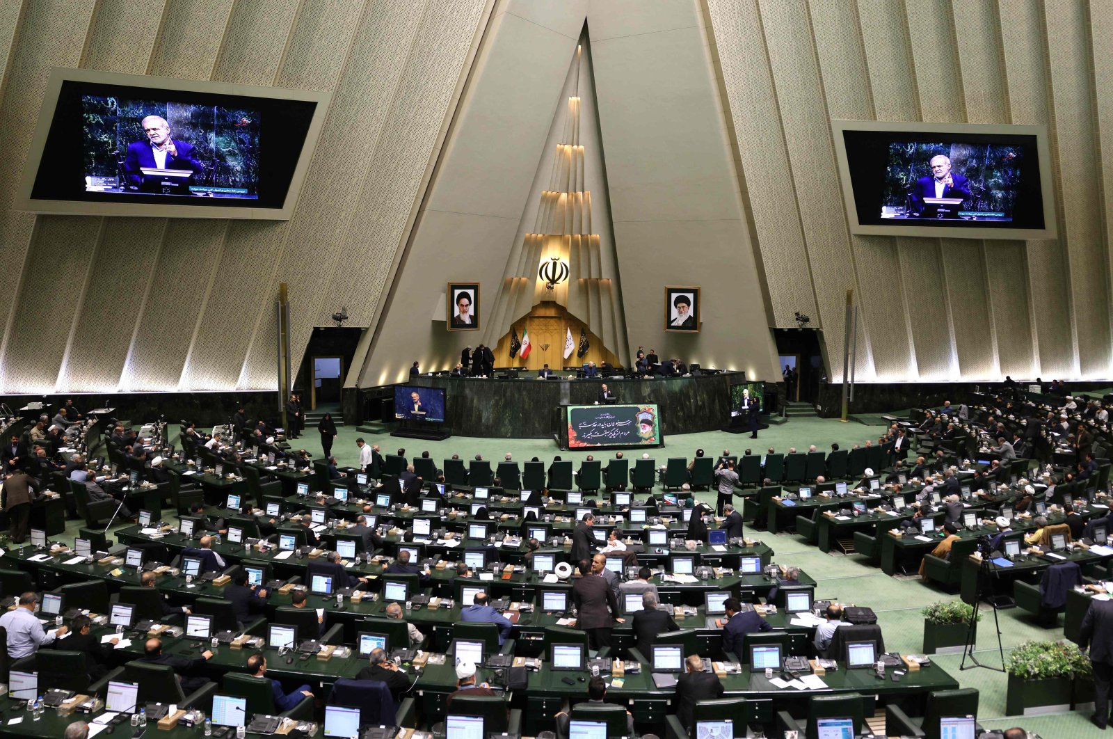 Iranian President Masoud Pezeshkian speaks to members of Parliament as he defends his Cabinet selection, Tehran, Iran, Aug.17, 2024. (AFP Photo)