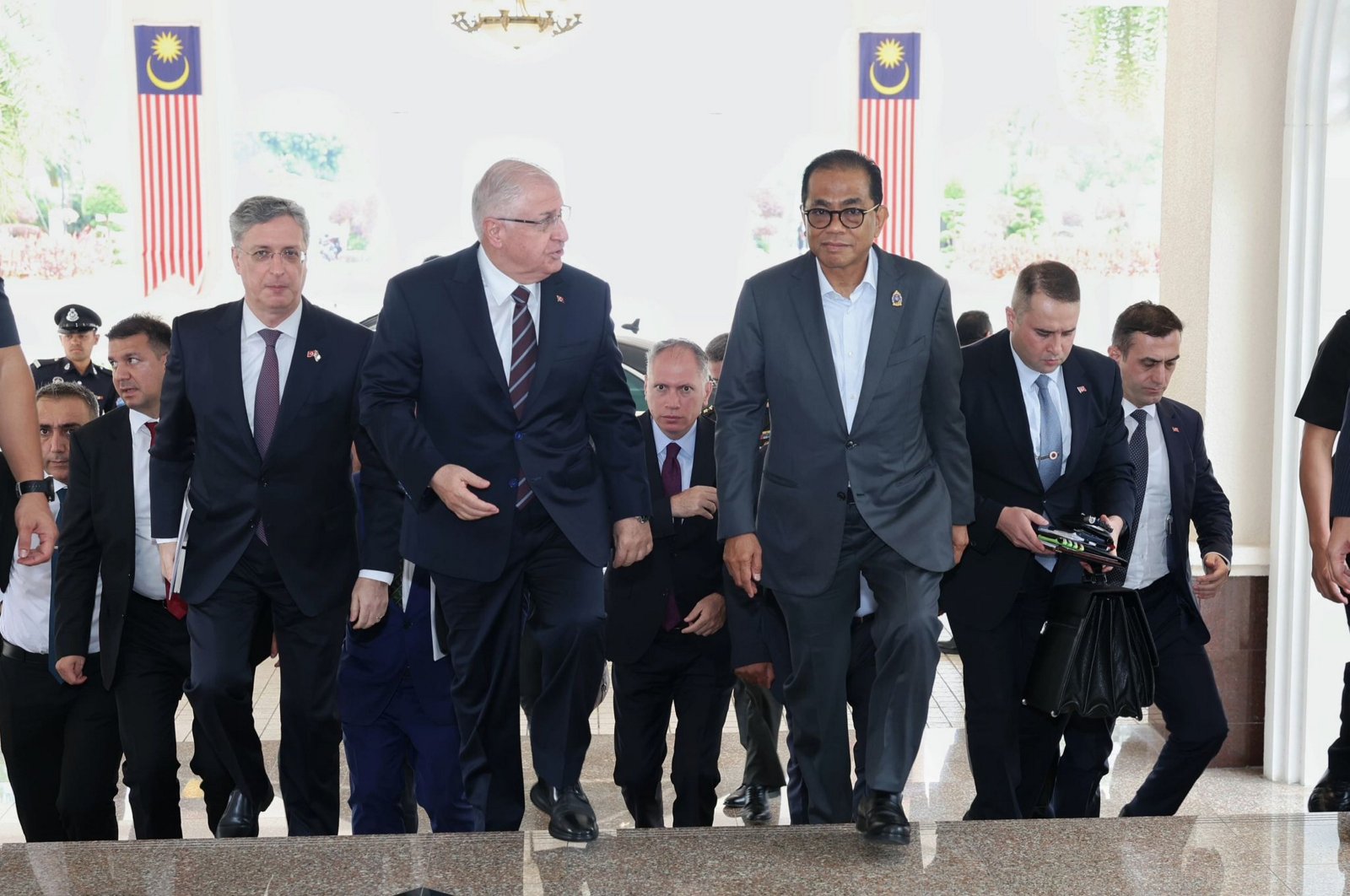 Defense Minister Yaşar Güler is being welcomed by his Malaysian counterpart Mohamed Khaled Nordin in the capital Kuala Lumpur, Malaysia, Aug.19, 2024 (AA Photo)