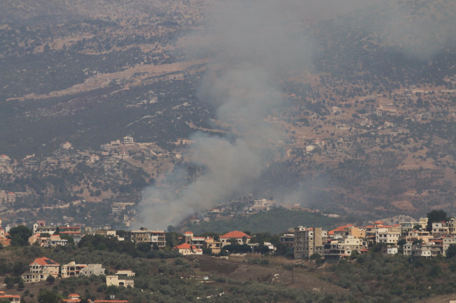 Smoke rises from Kfarhamam, amid cross-border hostilities between Hezbollah and Israeli forces, Lebanon, Aug. 17, 2024. (Reuters Photo)