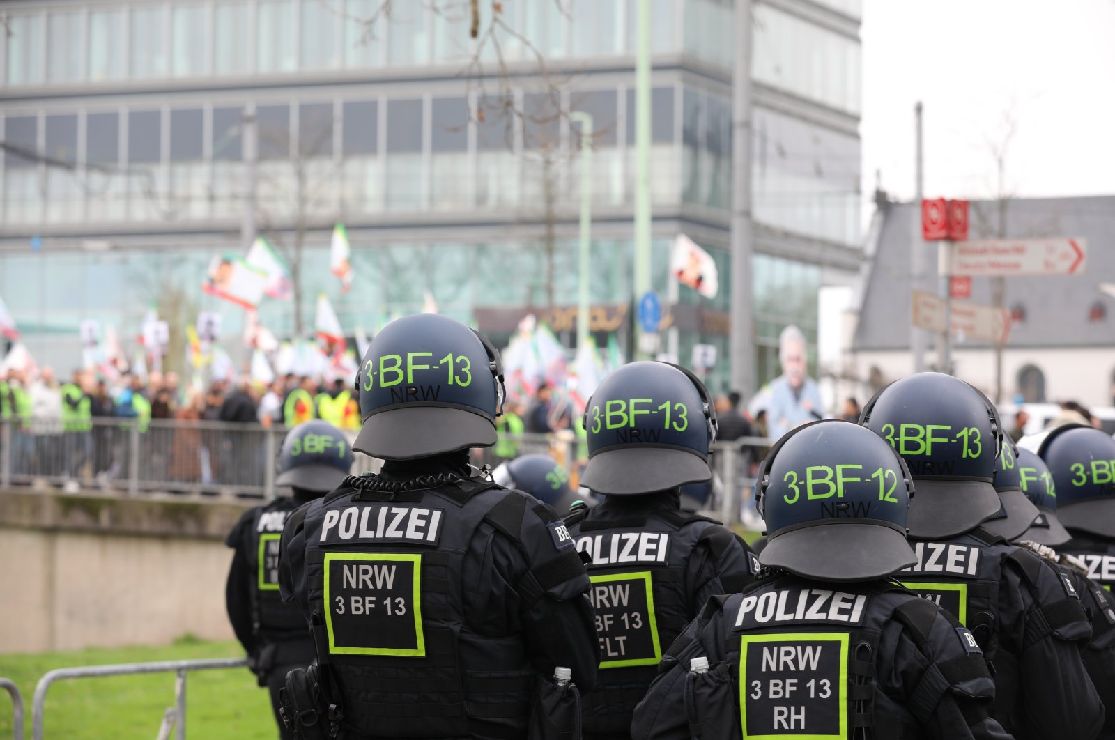 Police officers watch a rally of PKK supporters, Cologne, Germany, Feb. 17, 2024. (Getty Images)