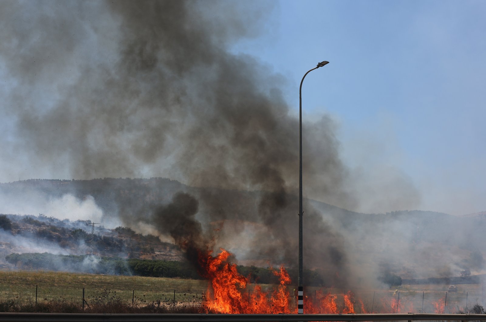 Smoke rises from a fire that broke out due to projectiles fired from southern Lebanon, Aug. 17, 2024. (EPA Photo)