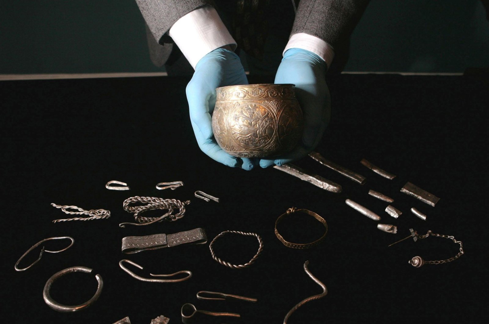 A silver cup, worth around 200,000 pounds and a number of newly conserved objects from a major Viking treasure hoard, going on display at The British Museum, London and the Yorkshire Museum, York, Aug. 28, 2009. (Reuters File Photo)