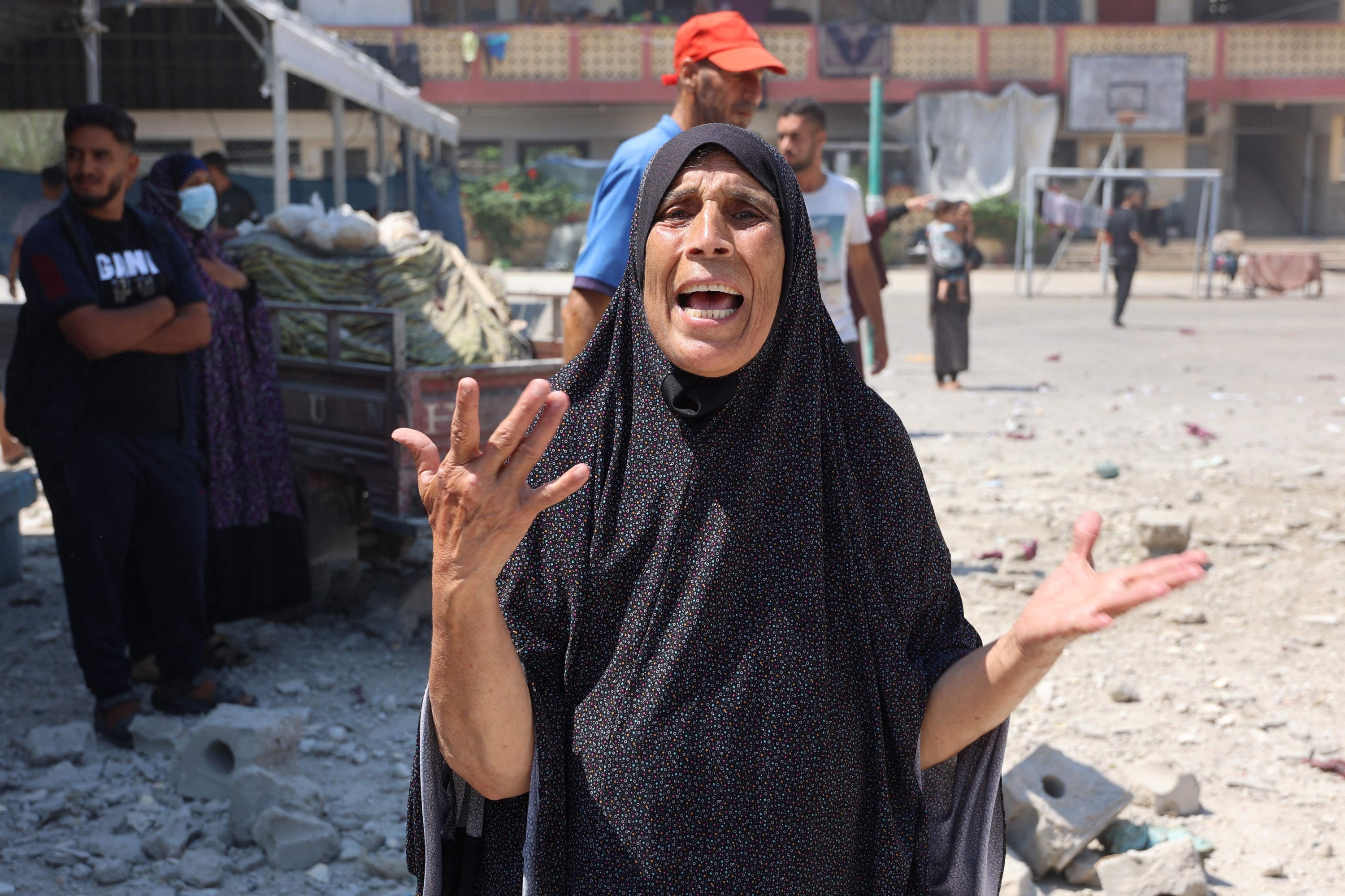 A woman reacts after an Israeli strike on a school housing displaced Palestinians, in Rimal, central Gaza, Palestine, Aug. 20, 2024. (AFP Photo)