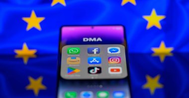 App icons of online platforms Google, Facebook, LinkedIn, Amazon, Apple Store and TikTok are displayed on a smartphone with the EU Digital Market Act (DMA) in this photo illustration, Brussels, Belgium, Feb. 17, 2024. (Reuters Photo)