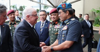 Defense Minister Yaşar Güler (L) shakes hands with his Malaysian counterpart Dato Seri Mohamed Khaled Nordin ahead of their meeting at the ministry, Kuala Lumpur, Malaysia, Aug. 20, 2024. (AA Photo)
