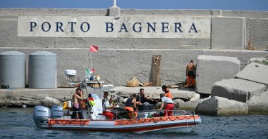 Divers leave Porticello for the rescue site near Sicily, Italy, Aug. 20, 2024. (AFP Photo)