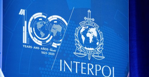 Interpol&#039;s logo is seen at the Closing Ceremony of the 91st INTERPOL General Assembly in Vienna, Dec. 3, 2023. (Reuters File Photo)