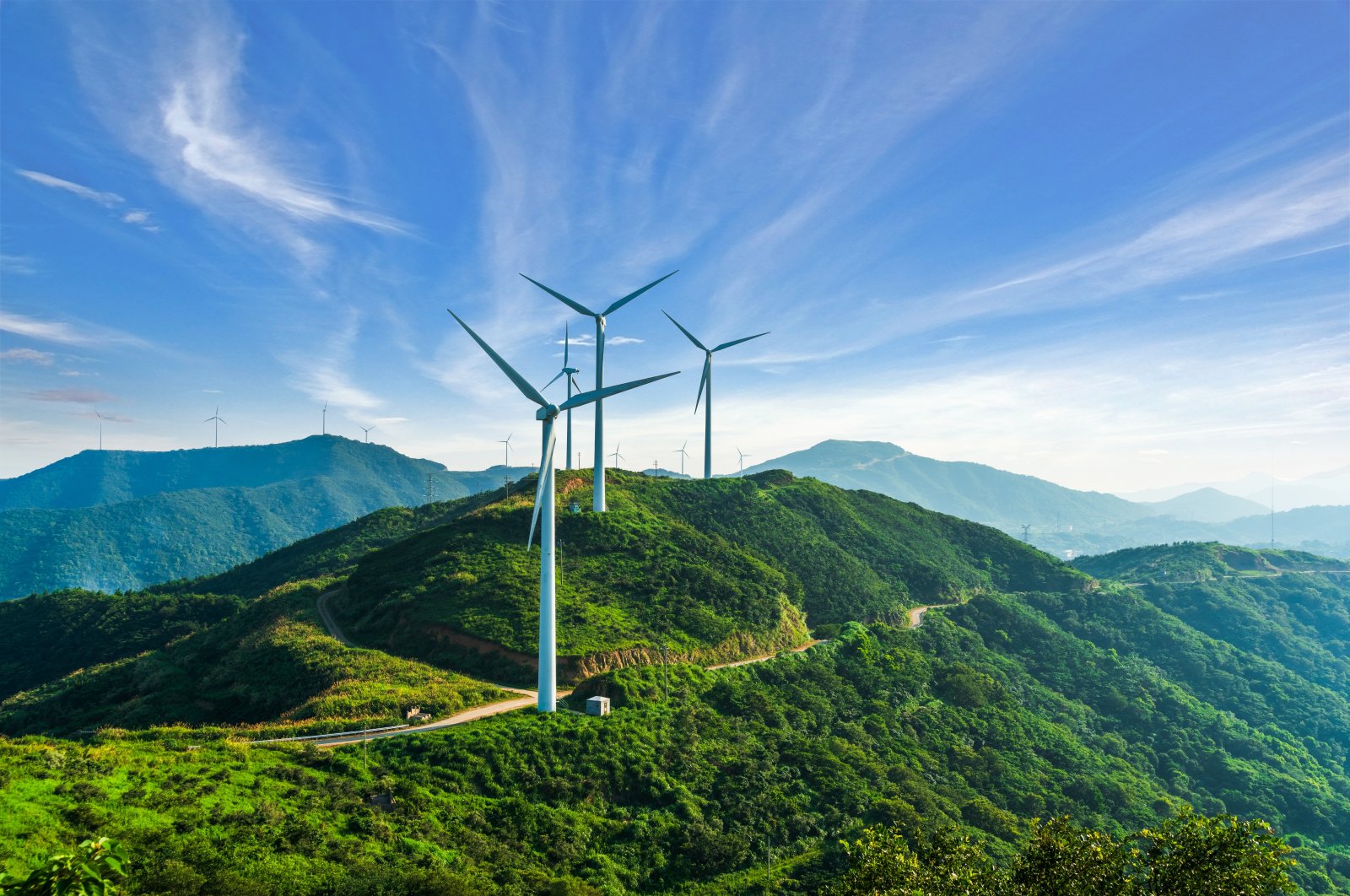 Wind turbines against a clear sky are seen in this undated stock photo. (Getty Images Photo)