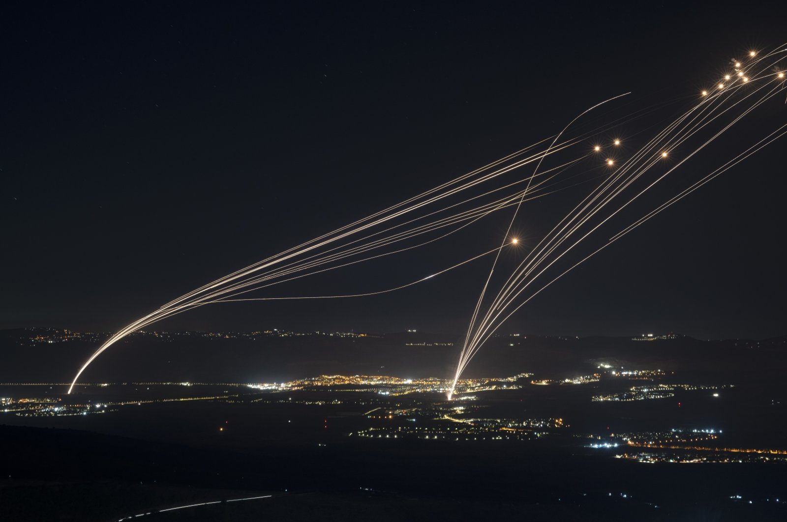 The Israeli Iron Dome air defense system intercepts attacks from Lebanon near the occupied Golan Heights, Aug. 4, 2024. (AP Photo)