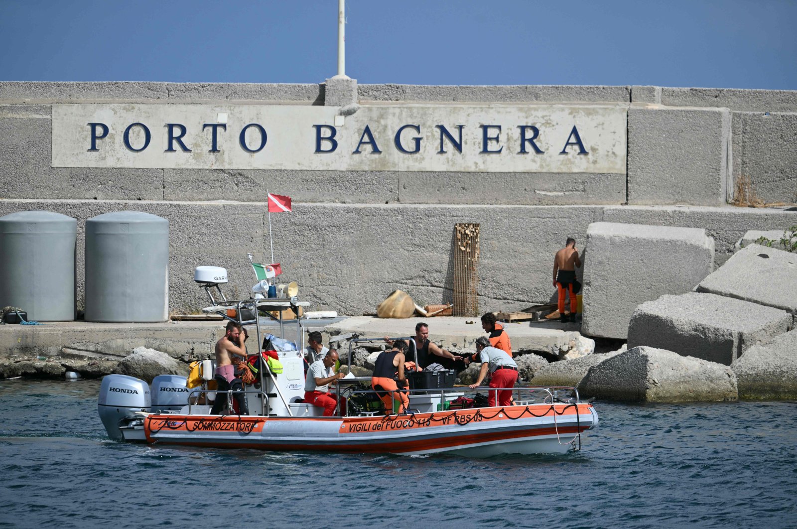 Divers leave Porticello for the rescue site near Sicily, Italy, Aug. 20, 2024. (AFP Photo)