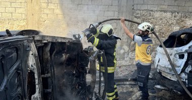 Emergency teams respond to the fire following the blast in Afrin, Syria, Wednesday, Aug. 21, 2024. (AA Photo)