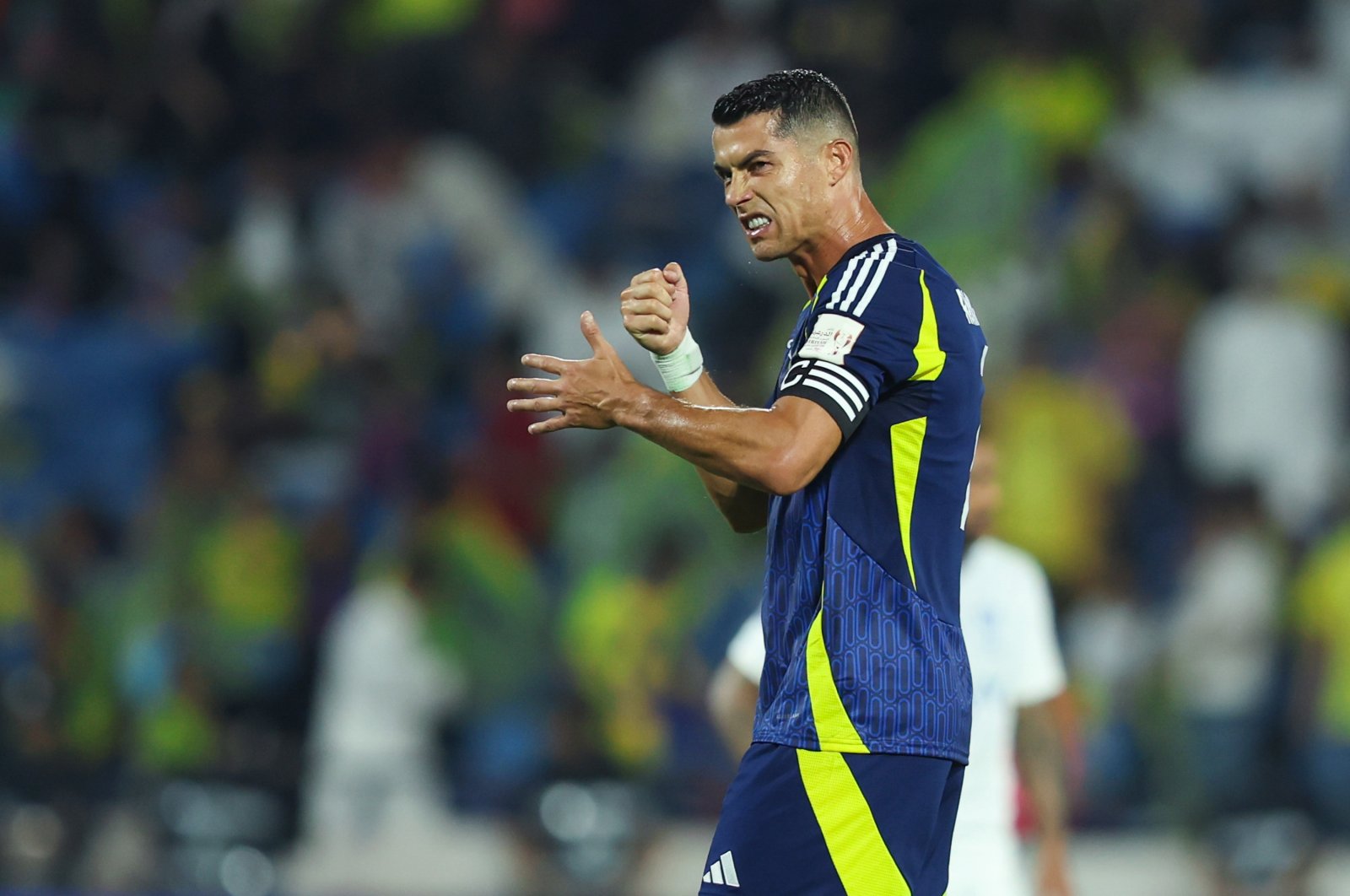 Al-Nassr&#039;s Cristiano Ronaldo celebrates after scoring the 1st goal during the Saudi Super Cup Final match between  Al Nassr and Al Hilal at Prince Sultan bin Abdul Aziz Stadium, Abha, Saudi Arabia, Aug. 17, 2024. (Getty Images Photo)