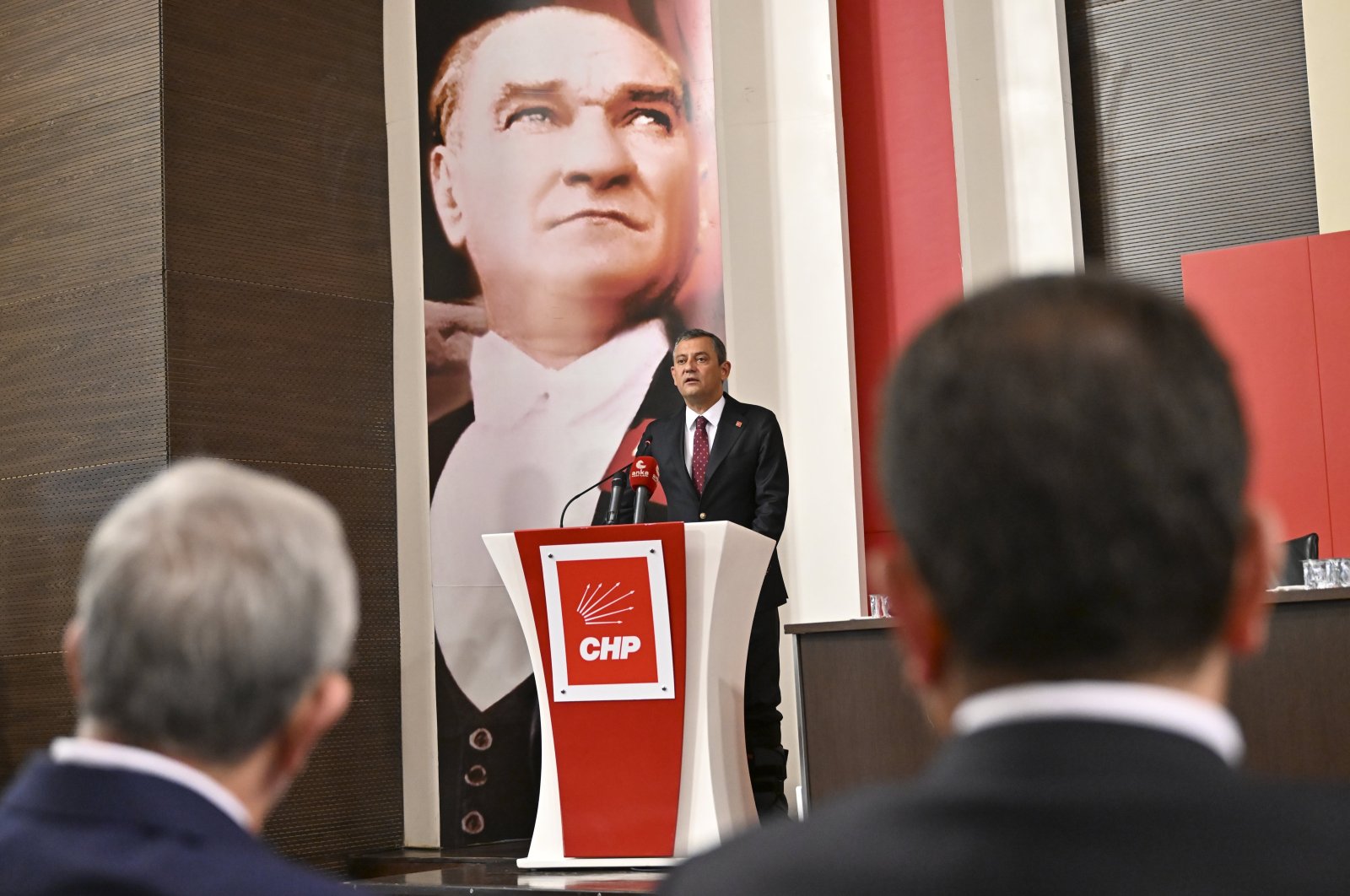 Istanbul Mayor Ekrem Imamoğlu (R) and Ankara Mayor Mansur Yavaş (L) look on as Republican People&#039;s Party (CHP) Chair Özgür Özel (C) speaks at party headquarters, Ankara, Türkiye, Aug. 20, 2024. (AA Photo)