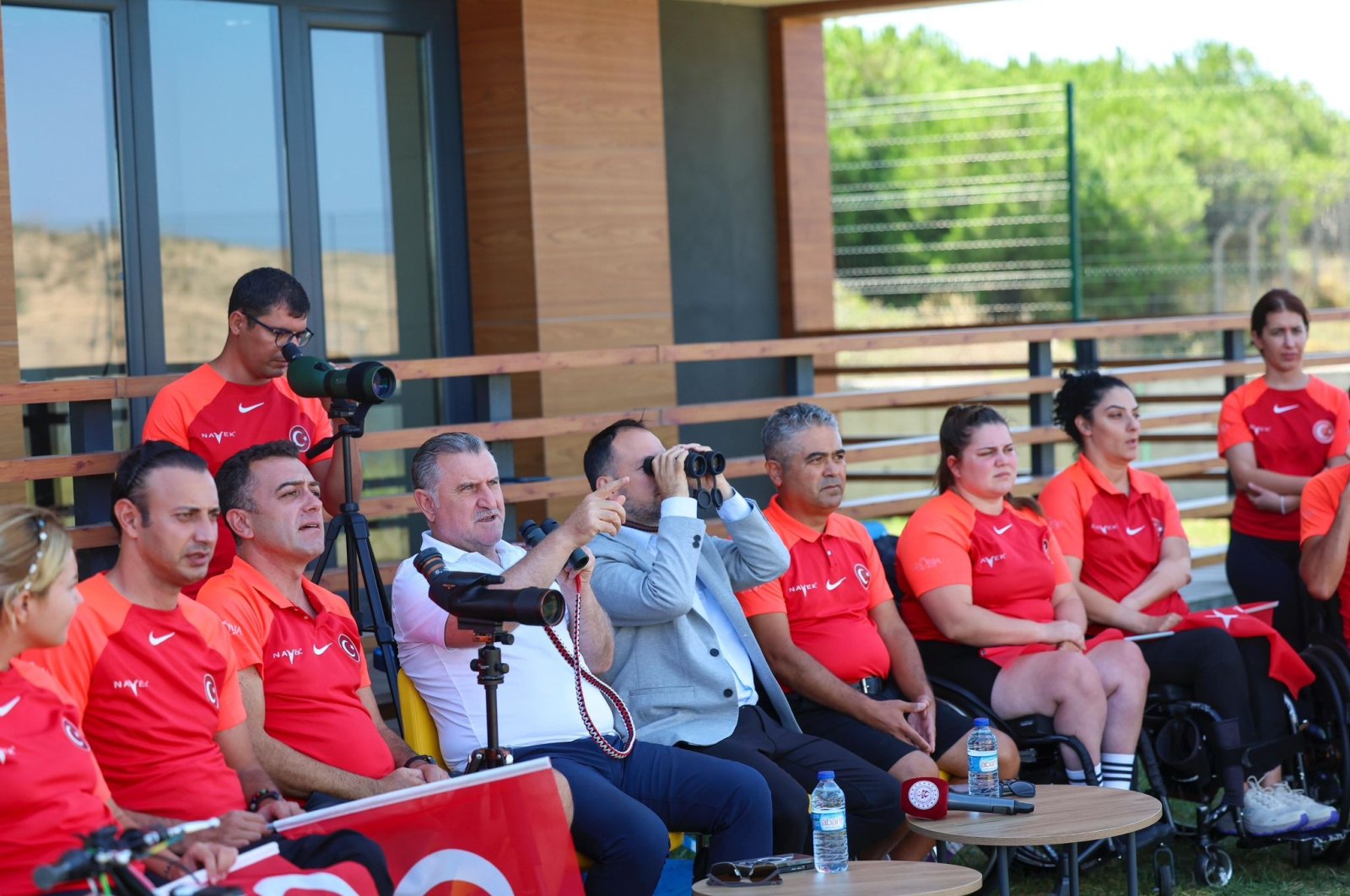 Türkiye’s Youth and Sports Minister, Osman Aşkın Bak (4th L) observes a training session for the national para-archers, Istanbul, Türkiye, Aug. 21,2 024. (DHA Photo)