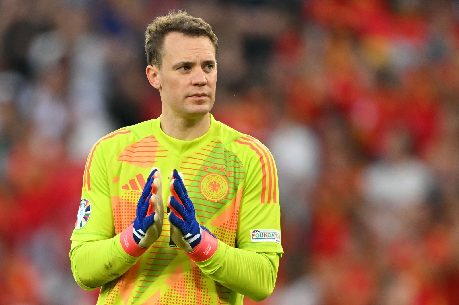 Germany&#039;s goalkeeper Manuel Neuer applauds the fans after the UEFA Euro 2024 quarterfinal football match between Spain and Germany at the Stuttgart Arena, Stuttgart, Germany, July 5, 2024. (AFP Photo)