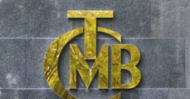 A logo of the Central Bank of the Republic of Türkiye (CBRT) is pictured at the entrance of its headquarters, Ankara, Türkiye, Oct. 15, 2021. (Reuters Photo)