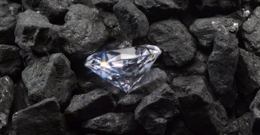Diamond in a bed of coal. (Getty Images)