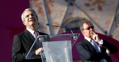 Laurent Freixe (L), executive vice president of Nestle, delivers a speech next to Richard Girardot, CEO of Nestle France, during a ceremony for the 150th anniversary of the Swiss food giant at the headquarters of Nestle France in Noisiel, east of Paris, France, June 23, 2016. (AFP Photo)