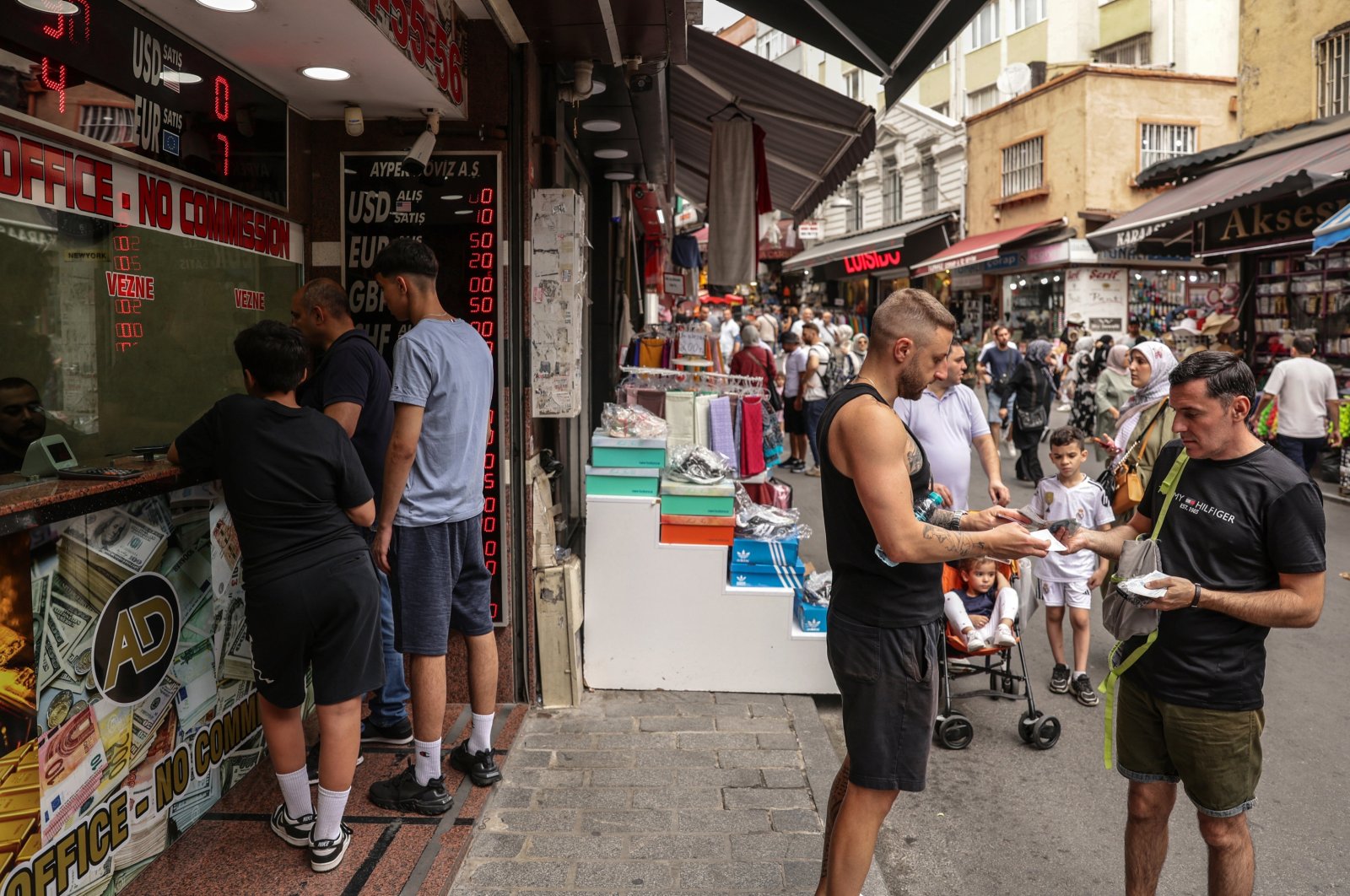 People visit a currency exchange office, Istanbul, Turkey, Aug. 21, 2024. (EPA Photo)